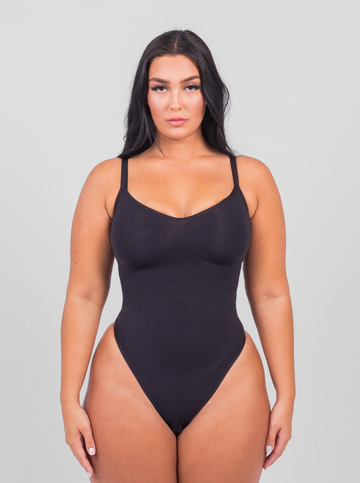 Stefanie - Spaghetti Strap Seamless Bodysuit with String Detail