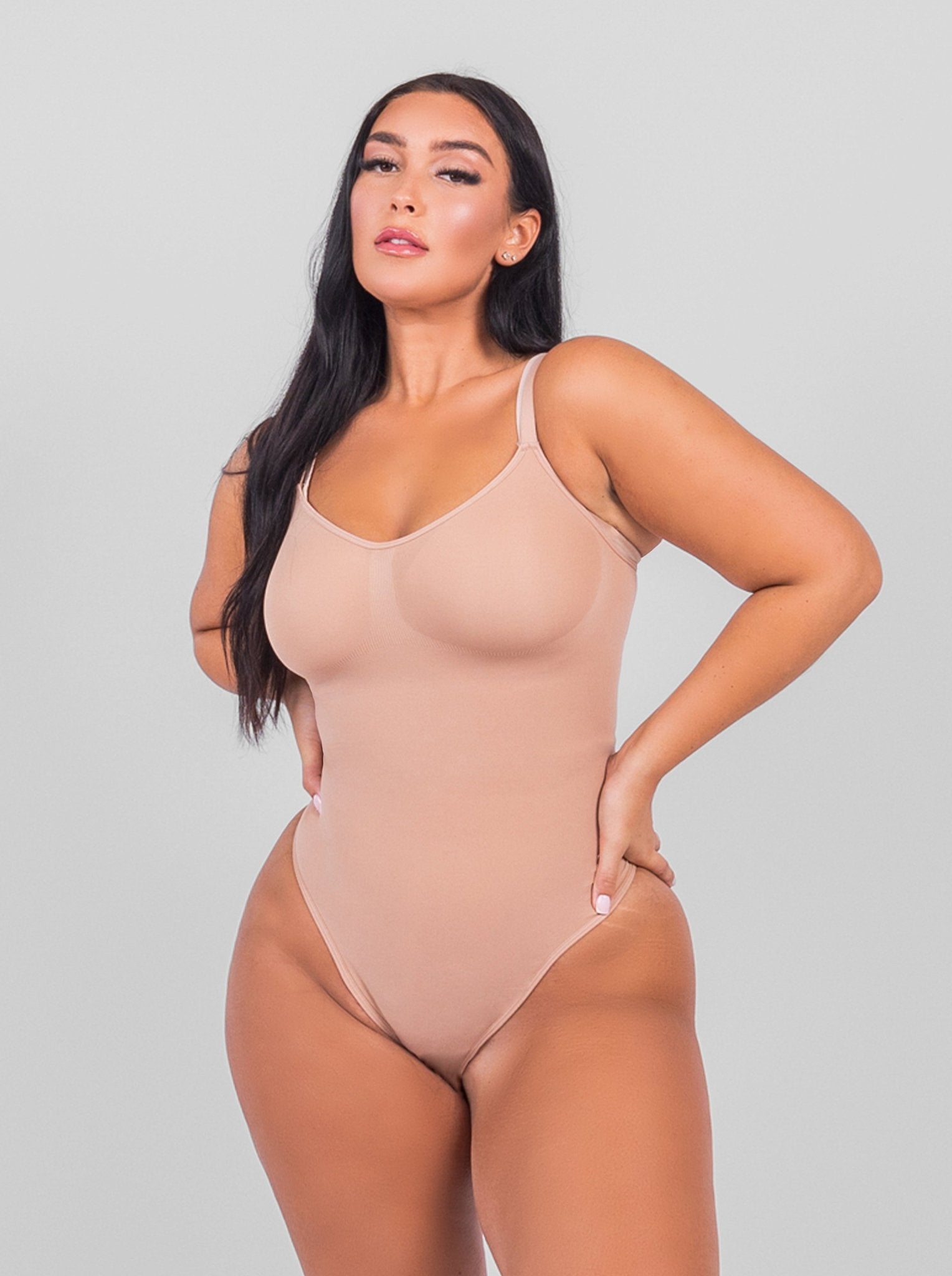 Stefanie - Spaghetti Strap Seamless Bodysuit with String Detail